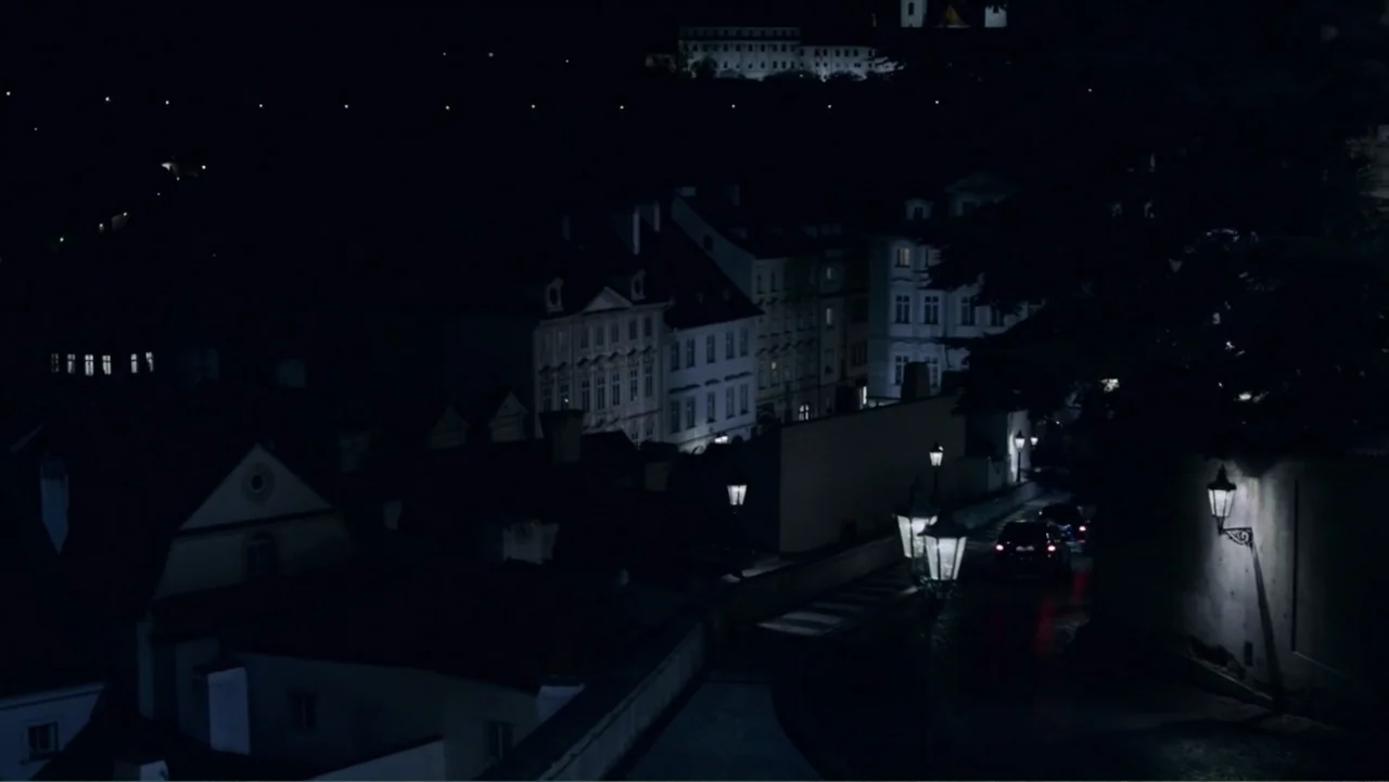 Underworld: Blood Wars (2016) movie still: establishing — A dark narrow street in a European city at night features historic architecture. A single…