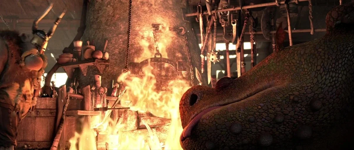 How to Train Your Dragon 2 (2014) movie still: medium — A dimly lit smithy contains tools hung on wooden beams above a central hearth. A bearded…