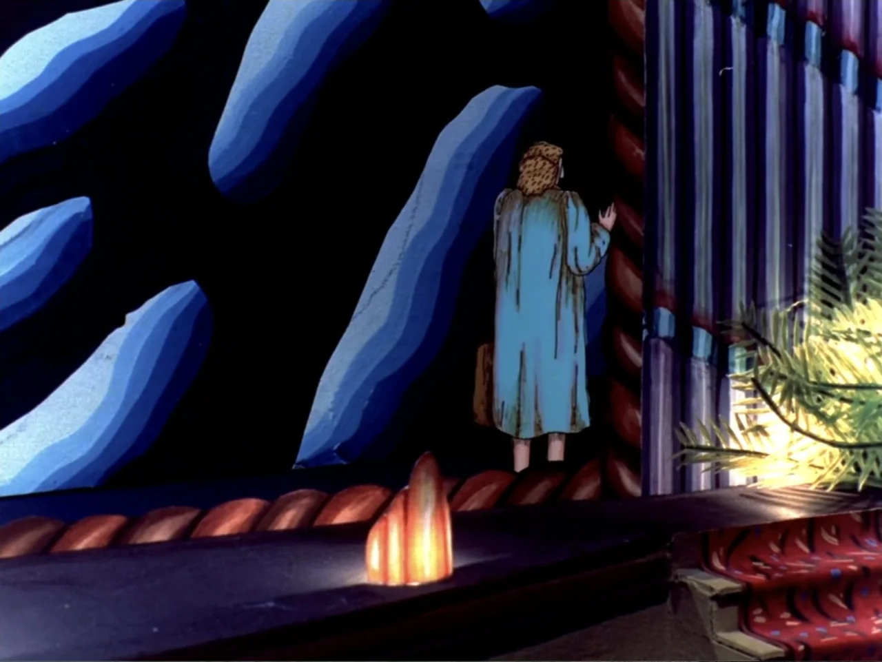 Asparagus (2007) movie still: medium — A theatrical studio set features a painted blue backdrop with stylized wave patterns. A person in a blue coat…