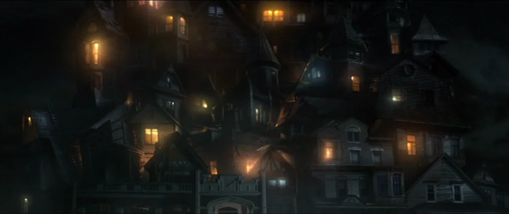 Abattoir (2016) movie still: establishing — A dark, asymmetrical Victorian mansion features an complex arrangement of multiple gables and windows.…