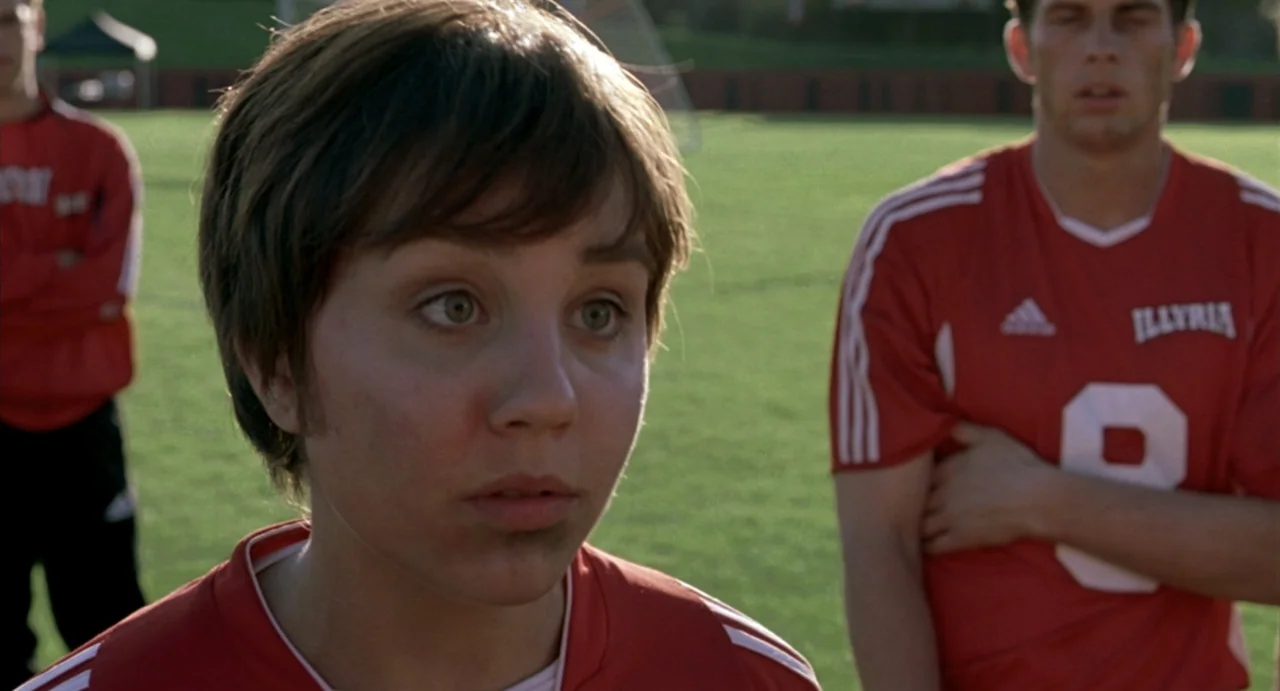 She's the Man (2006) movie still: medium — A green soccer field serves as the backdrop for two teenage soccer players. The main subject in the…