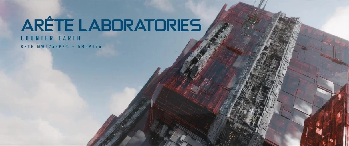 Guardians of the Galaxy Vol. 3 (2023) movie still: establishing — A massive, angular laboratory structure with translucent red glass panels stands…