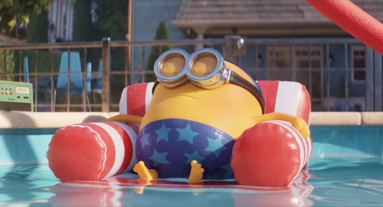 Despicable Me 4 (2024) movie still: medium — A backyard swimming pool features a yellow creature relaxing on an inflatable lounge chair. The minion…