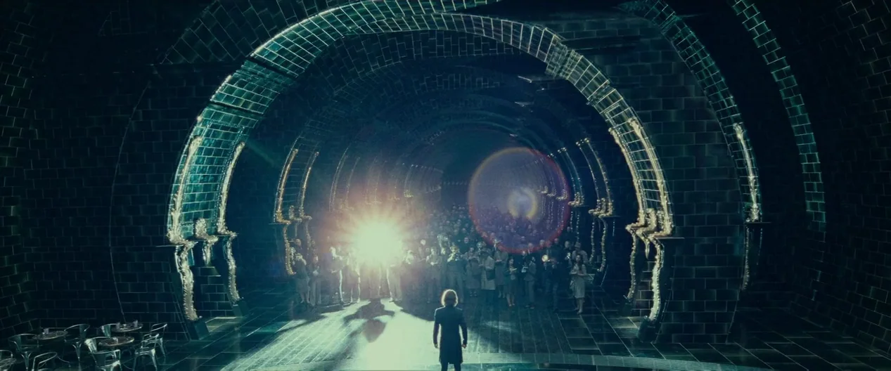 Harry Potter & The Deathly Hallows Part 1 (2010) movie still: wide — A vast arched underground tunnel is constructed from dark green tiles and gold…