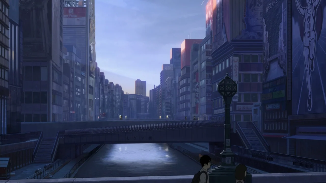 Napping Princess (2017) movie still: establishing — An urban canal passes beneath a footbridge in a dense city district at dusk. Towering buildings…