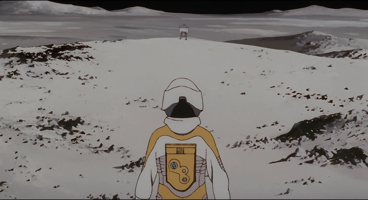 Millenium Actress (2001) movie still: wide — A desolate, rocky lunar landscape extends to a black horizon under harsh light. An astronaut stands on…