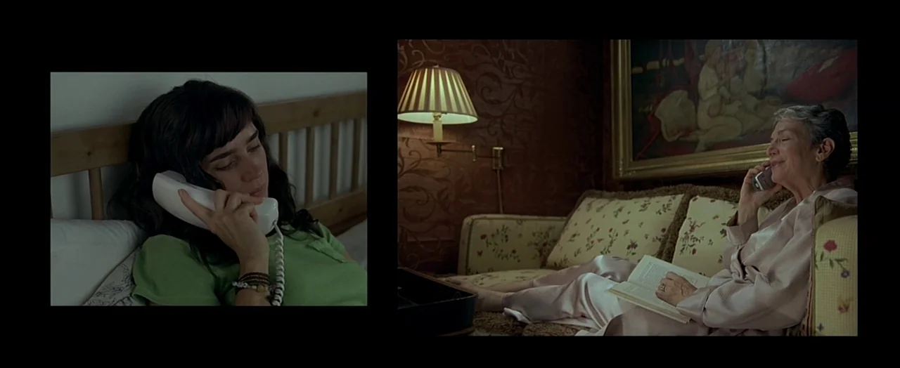 Little Children (2006) movie still: medium — A split screen shows two separate indoor environments with different lighting schemes and decor. Two…