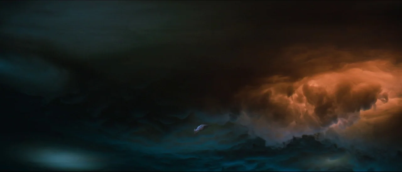 The NeverEnding Story (1984) movie still: establishing — A dark night sky is filled with thick, turbulent clouds stretching across the frame.…
