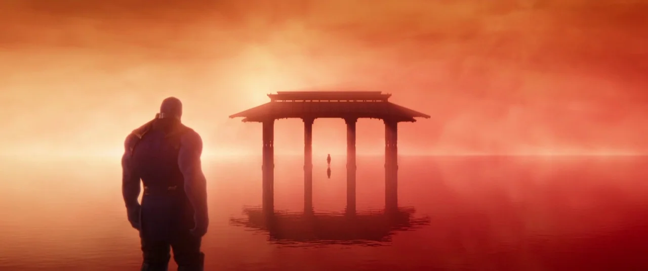 Avengers: Infinity War (2018) movie still: wide — A vast, calm expanse of water under a bright orange, hazy sky. A traditional wooden gate structure…