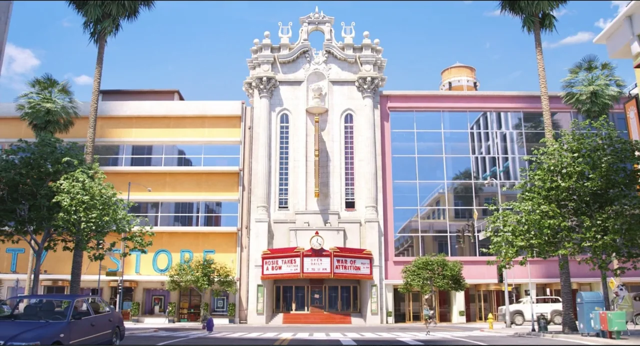Sing (2016) movie still: establishing — A street view of an ornate cinema building flanked by modern storefronts. Palm trees line the sidewalk under…