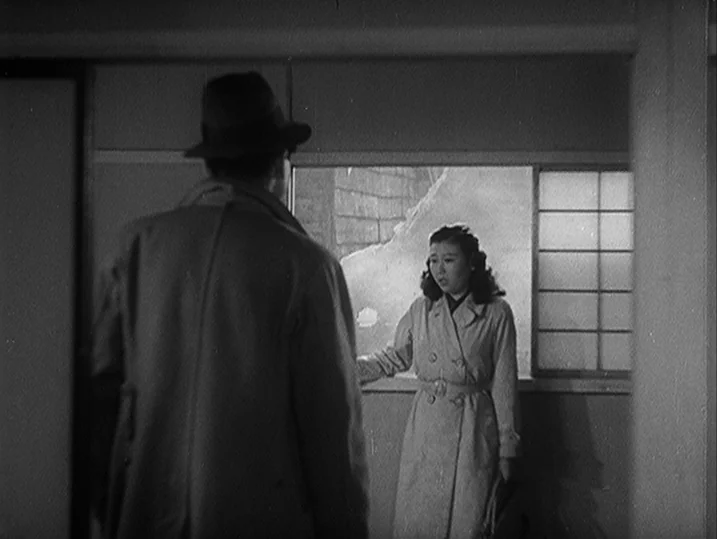 Anatomy of a Relationship (1976) movie still: medium — A Japanese apartment interior features sliding paper screens and a framed glass window. A man…