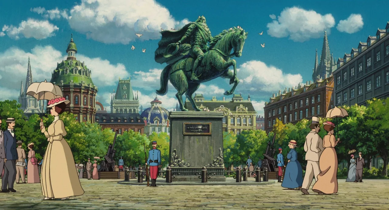 Howl’s Moving Castle (2004) movie still: wide — A sunny public square features a prominent central bronze statue of a horseman. Period-dressed…
