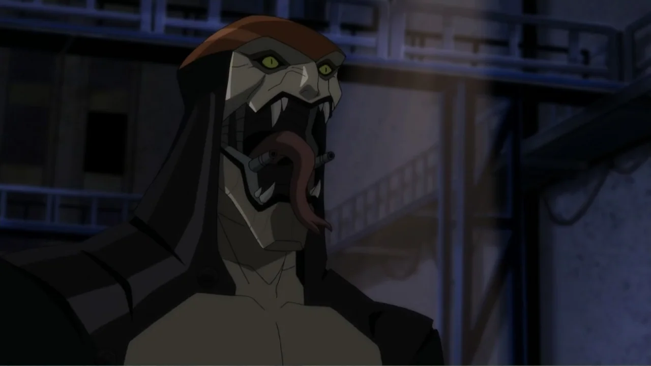 Suicide Squad: Hell to Pay (2018) movie still: closeup — A dark industrial outdoor area with metal scaffolding visible in the blurry background. A…