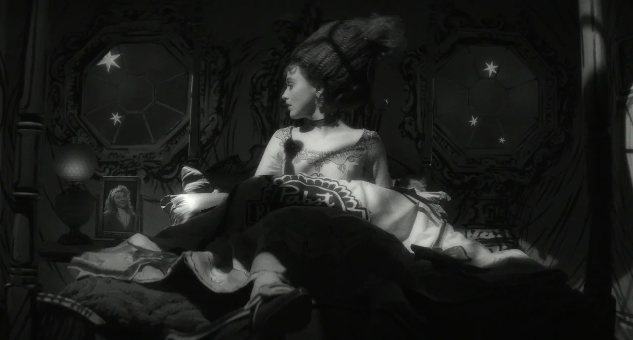 Lisa Frankenstein (2024) movie still: medium — A dimly lit room with hand-painted star patterns on the wall behind the bed. A woman with high-styled…