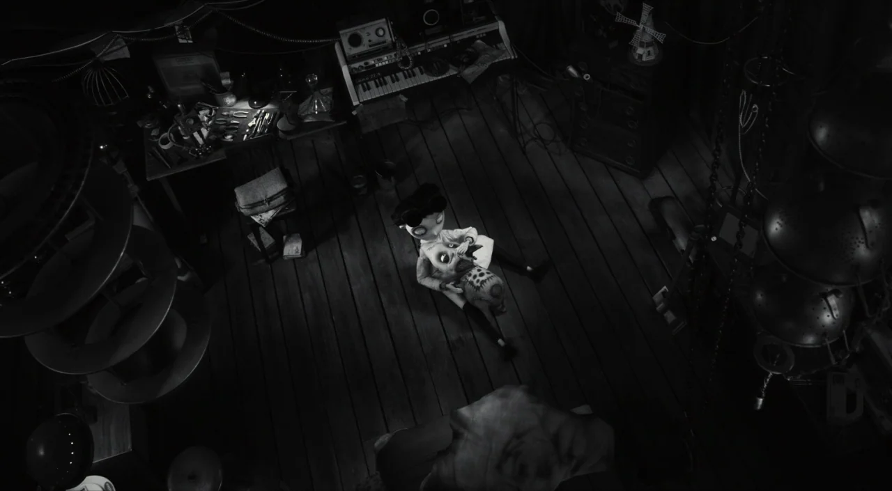 Frankenweenie (2012) movie still: wide — A dark, cluttered workshop contains various mechanical tools and musical equipment scattered around. A…