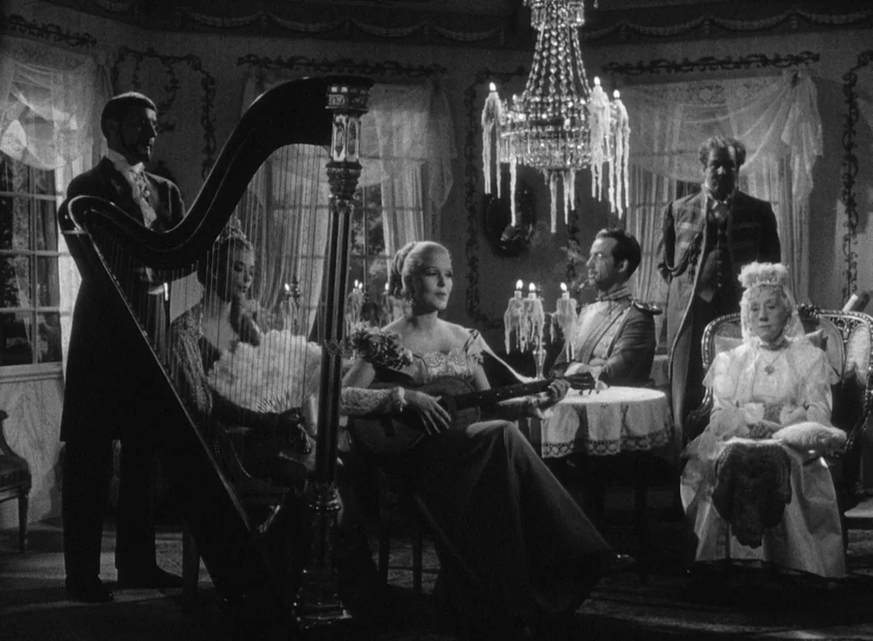 Smiles Of A Summer Night (1955) movie still: wide — An opulent nineteenth-century drawing room with ornate wall moldings, large windows, and a…