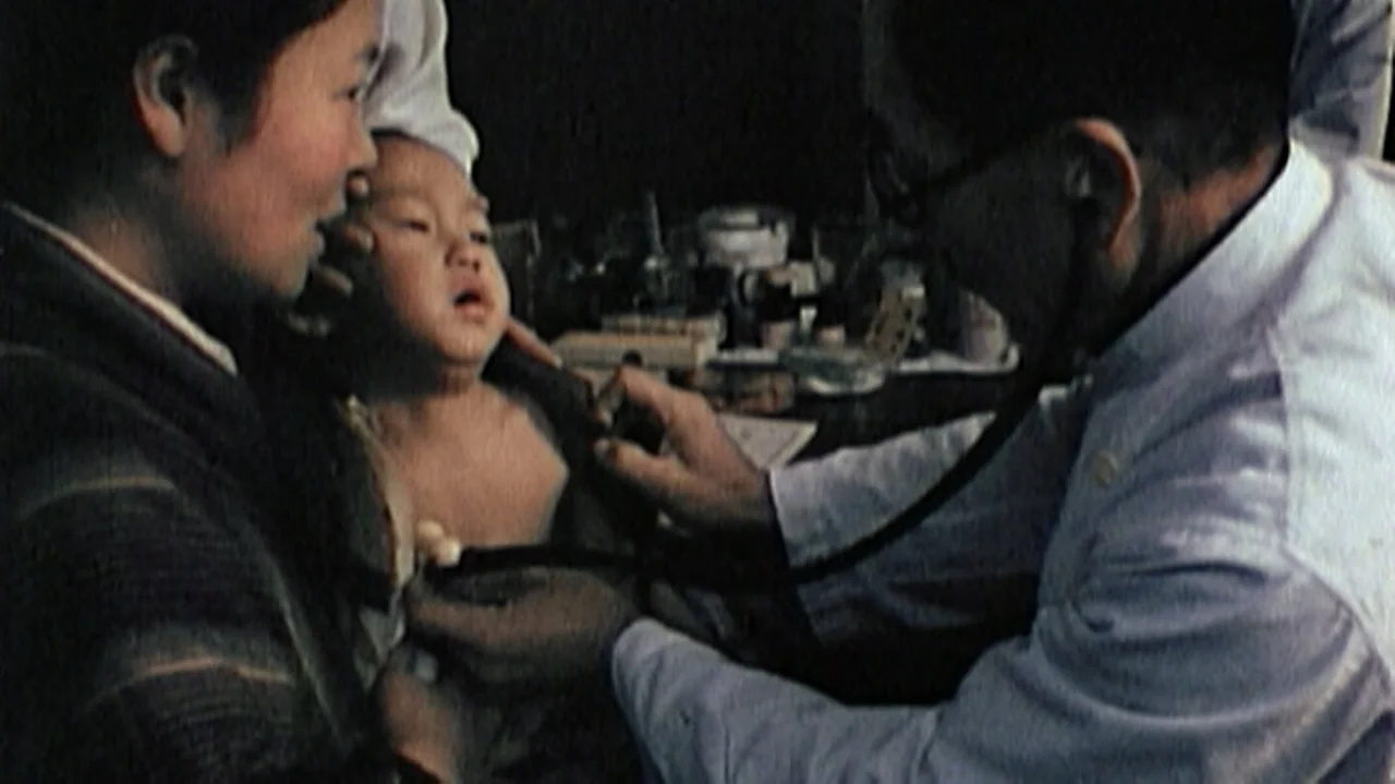 White Light/Black Rain: The Destruction of Hiroshima and Nagasaki (2007) movie still: medium — A medical exam room features various medicinal…
