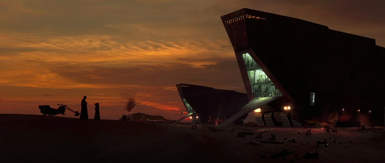 Star Wars: Episode II – Attack of the Clones (2002) movie still: wide — A vast sandy desert landscape features two massive, angular metal spacecraft…