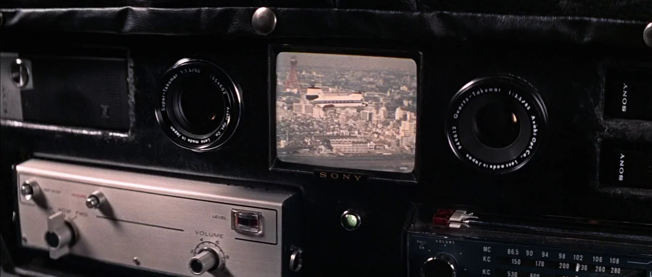 You Only Live Twice (1967) movie still: closeup — A close-up view of a black, leather-padded equipment rack houses a small screen. The Sony monitor…