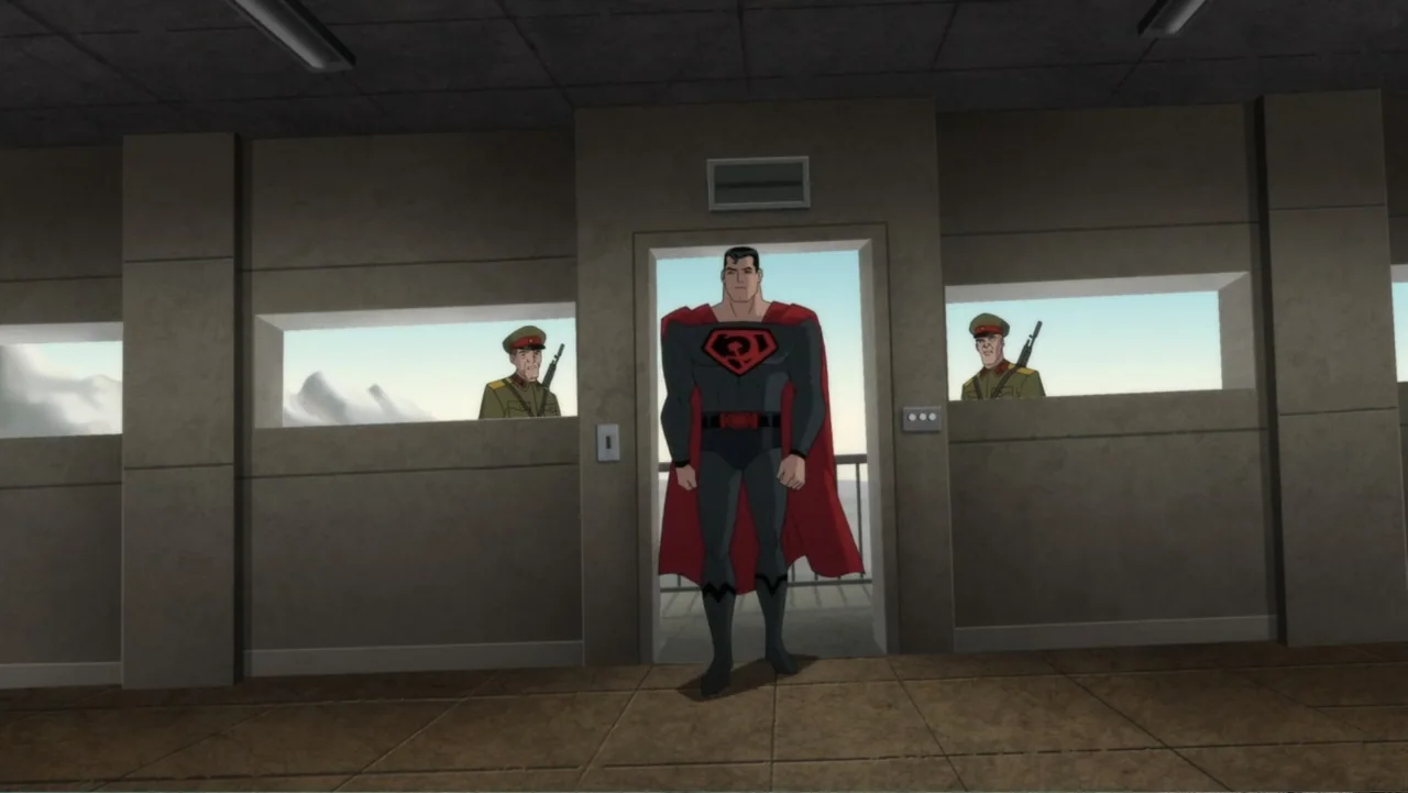 Superman: Red Son (2020) movie still: fullbody — A sterile concrete room features a central doorway flanked by two horizontal windows. A central…