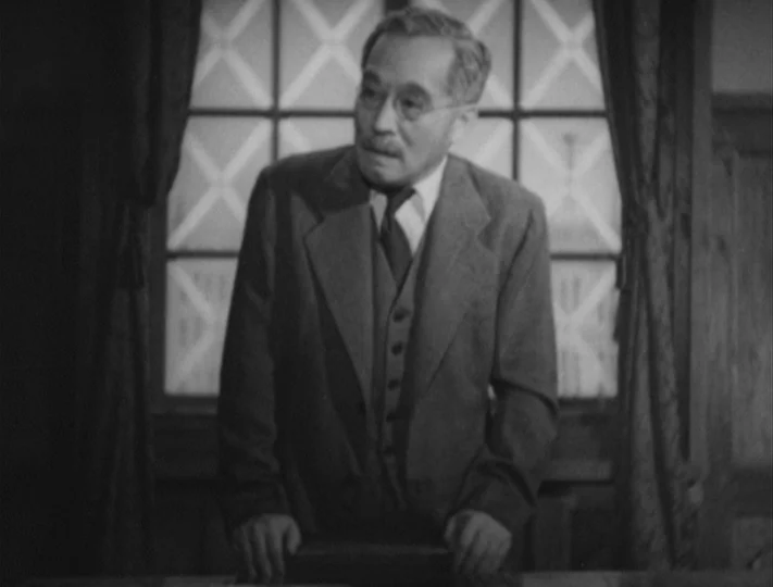 No Regrets for Our Youth (1946) movie still: medium — An interior space with a large window featuring a cross-hatched grid pattern. An elderly man…