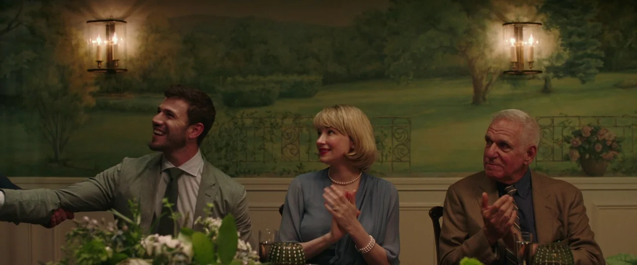 Swallow (2020) movie still: medium — A formal dining area features a large pastoral landscape mural on the back wall. Three individuals sit at a…
