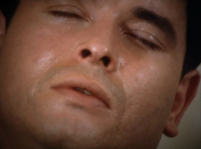 The Merchant Of The Four Seasons (1971) movie still: closeup — A close-up view focuses entirely on the facial features of an adult male. The subject…