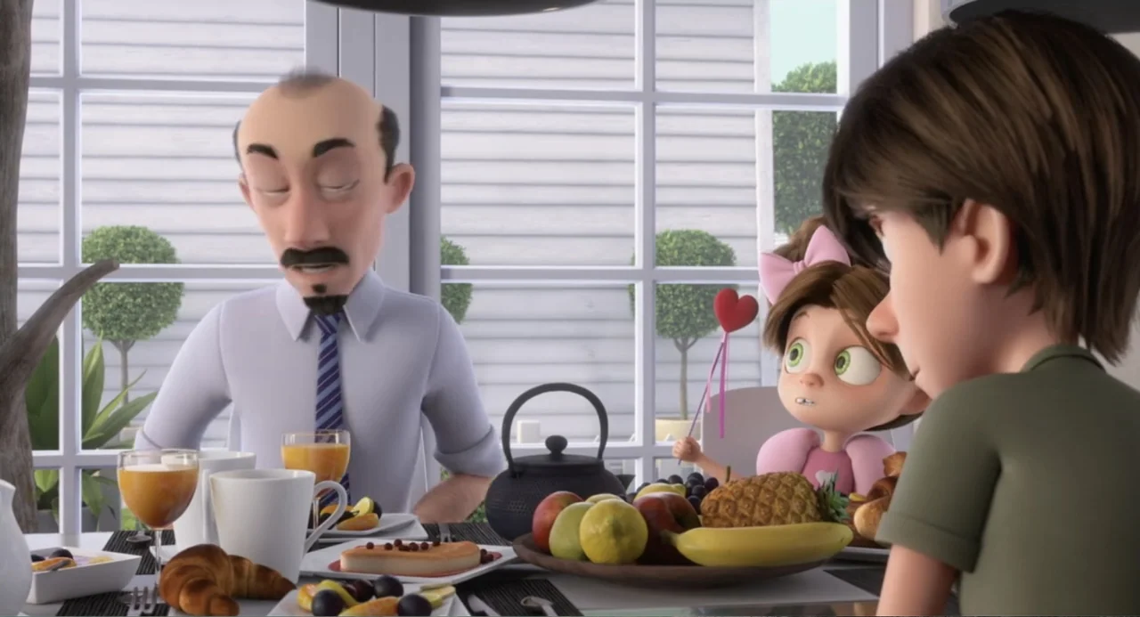 Luis and the Aliens (2018) movie still: medium — A family sits at a breakfast table in a brightly lit modern dining room. The father, young…