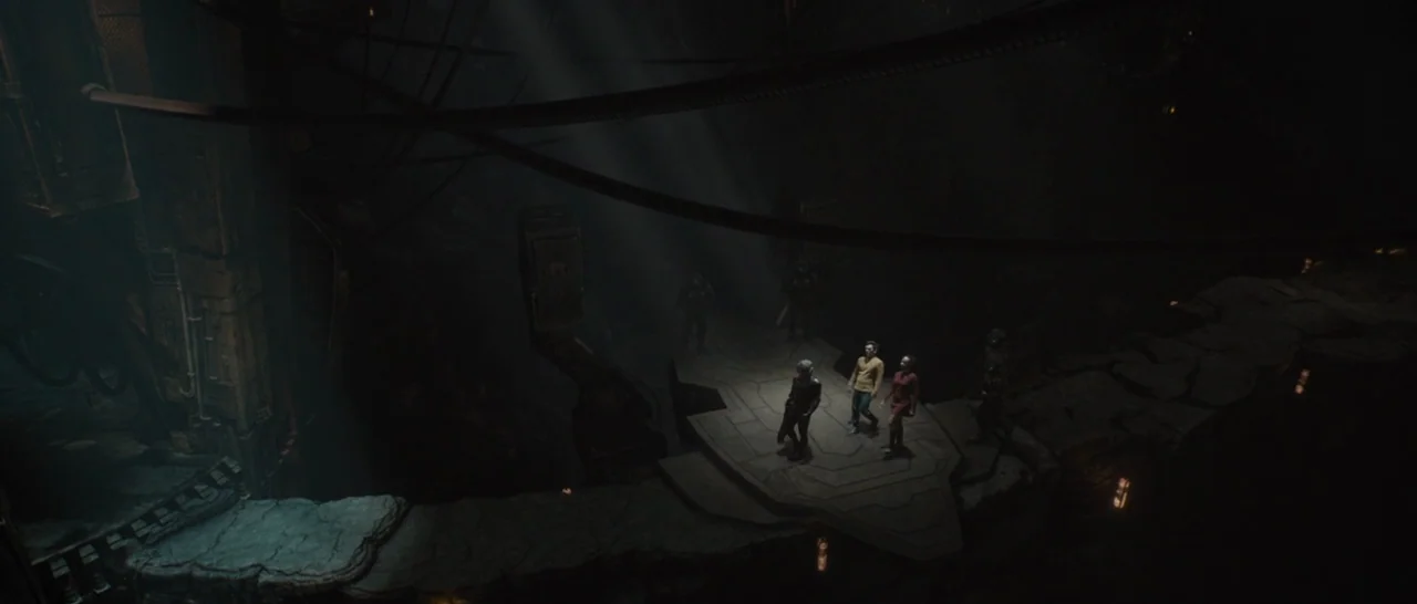 Star Trek Beyond (2016) movie still: wide — A dark subterranean space features heavy industrial piping and a central stone observation deck. A small…