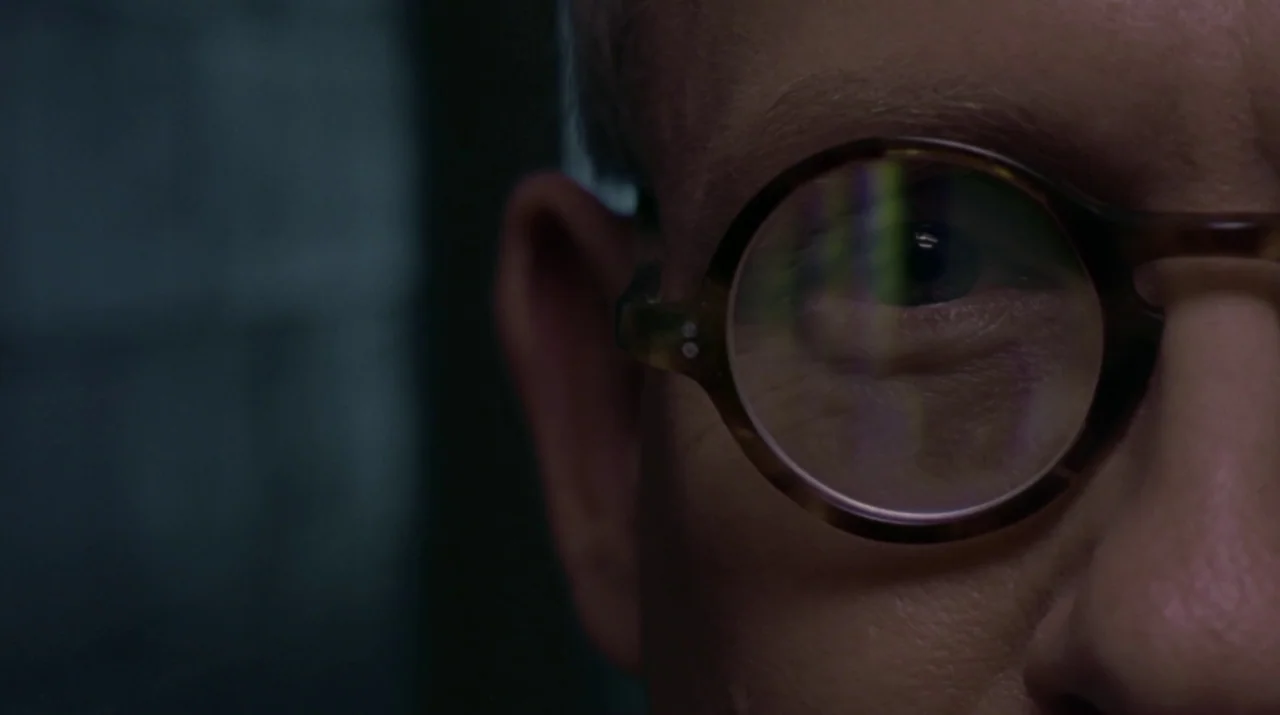 Lady in the Water (2006) movie still: closeup — A close-up view shows the eye and part of the face of an individual. Reflections from a display…