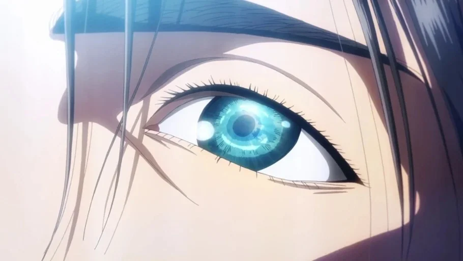 Attack on Titan (2013) movie still: closeup — An abstract, extreme close-up shot focused on a single human eye. The eye is bright blue with visible…