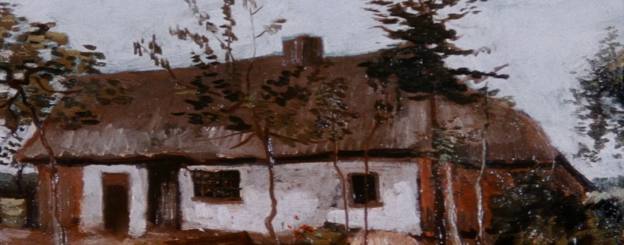 Lust For Life (1956) movie still: wide — A rural cottage with a thatched roof sits amidst several trees. The building features white-washed walls…