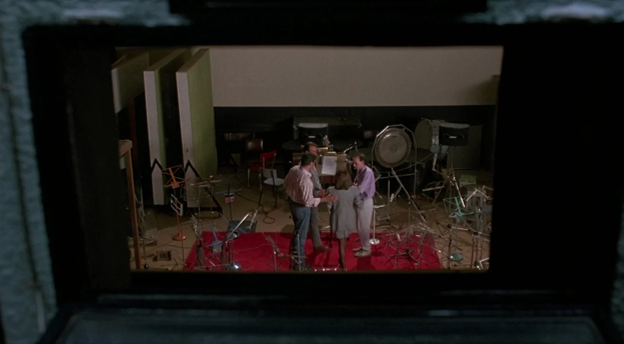 Women on the Verge of a Nervous Breakdown (1988) movie still: wide — A spacious room features sound-dampening acoustic panels and numerous…