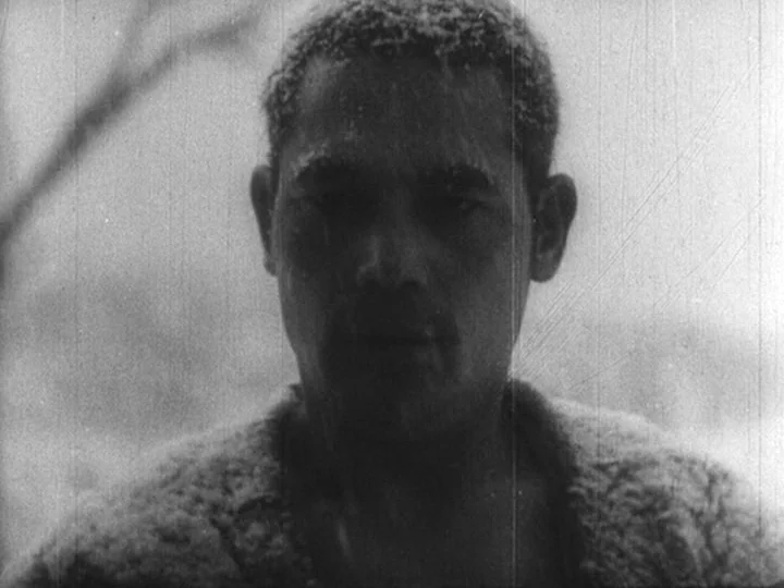Sanshiro Sugata Part II (1945) movie still: closeup — A man stands outdoors in a field during a cold winter day. Snow or frost accumulates on his…