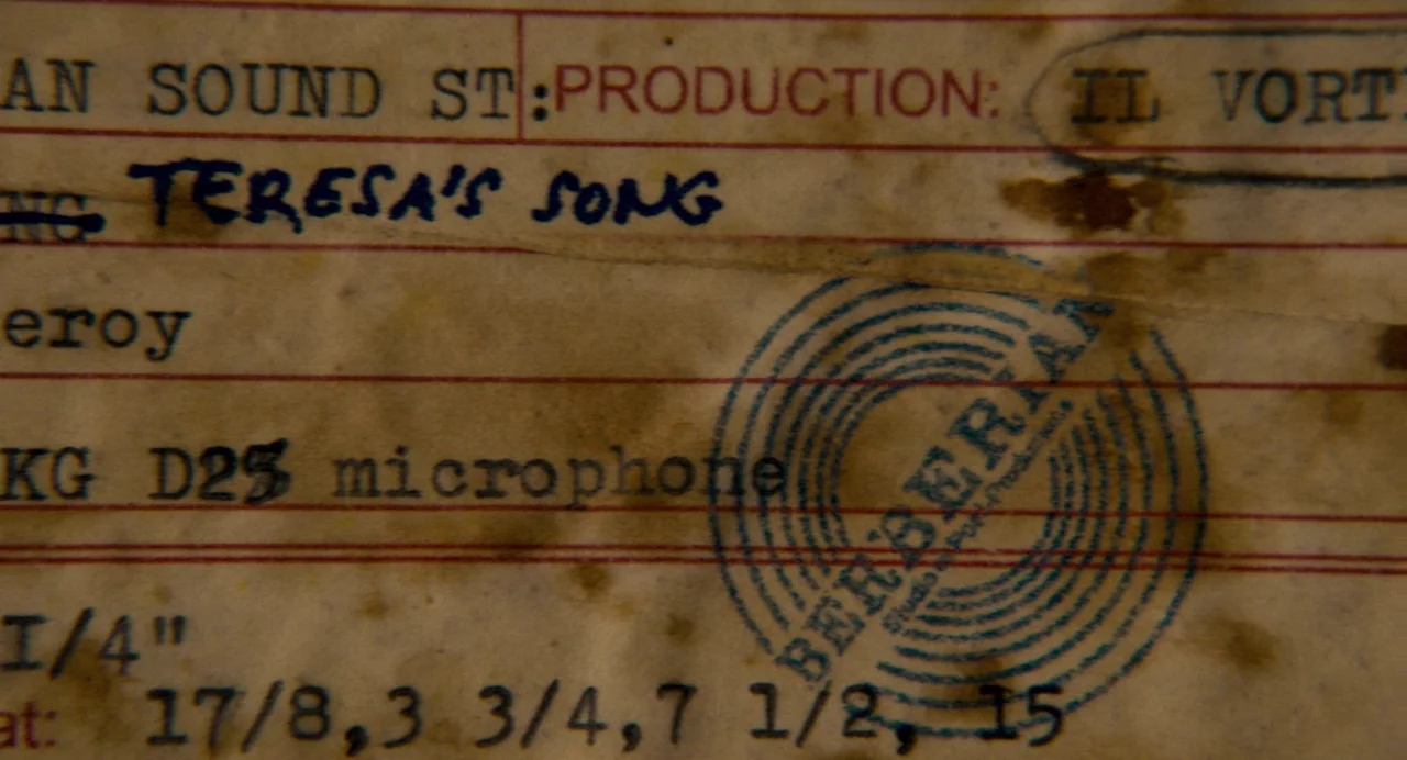 Berberian Sound Studio (2012) movie still: closeup — A weathered, stained piece of paper contains typed production information and handwritten…