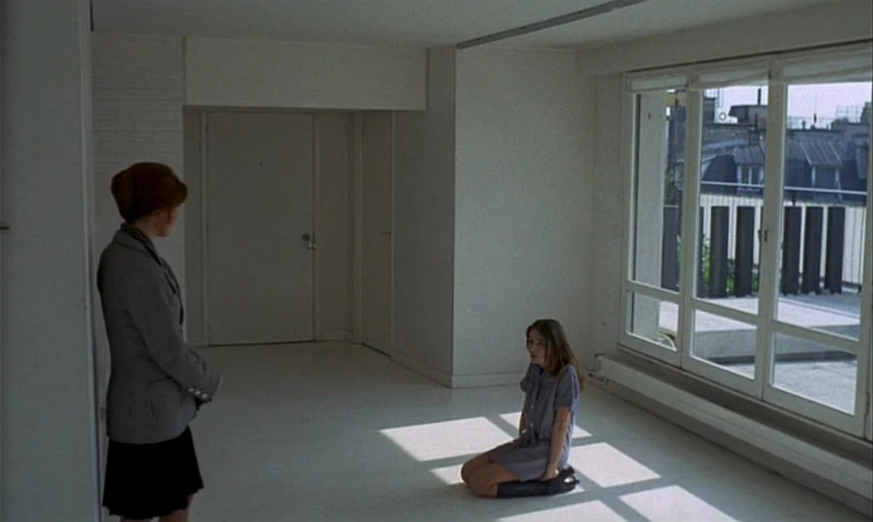 Successive Slidings of Pleasure (Glissements progressifs du plaisir) (1974) movie still: fullbody — A stark white, unfurnished apartment room…