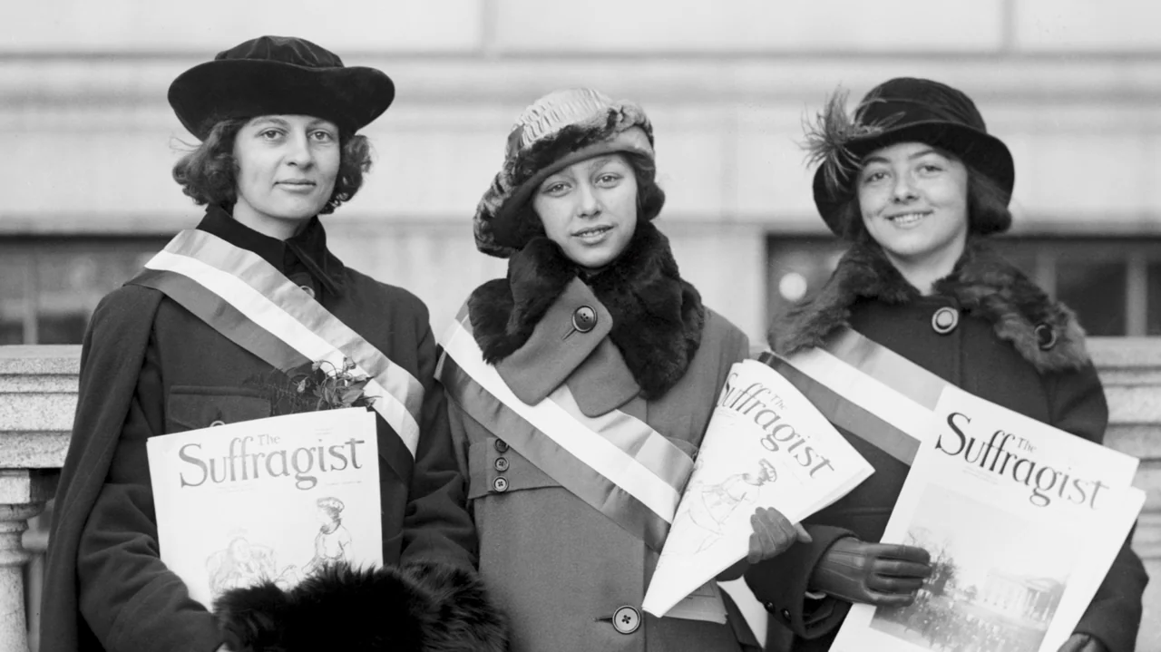 The Soul of America (2020) movie still: medium — Three women stand side by side on stone steps in front of a building. They wear early 20th-century…