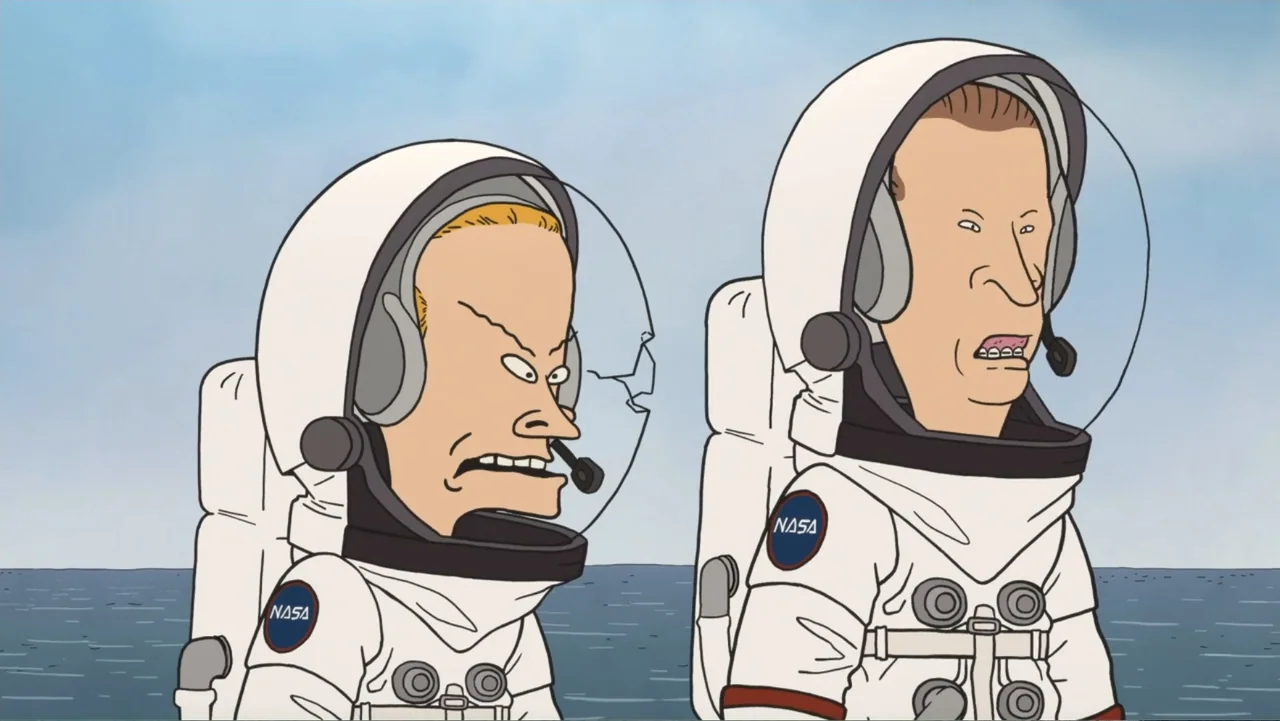 Beavis and Butt-Head Do the Universe (2022) movie still: medium — Two animated men in white astronaut suits stand before a blue ocean. The…