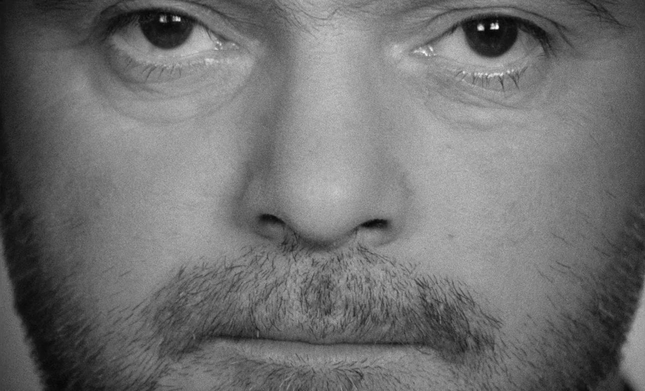 Goto, Island of Love (1969) movie still: closeup — A close-up shot of a man's face against a neutral background. The subject maintains eye contact…