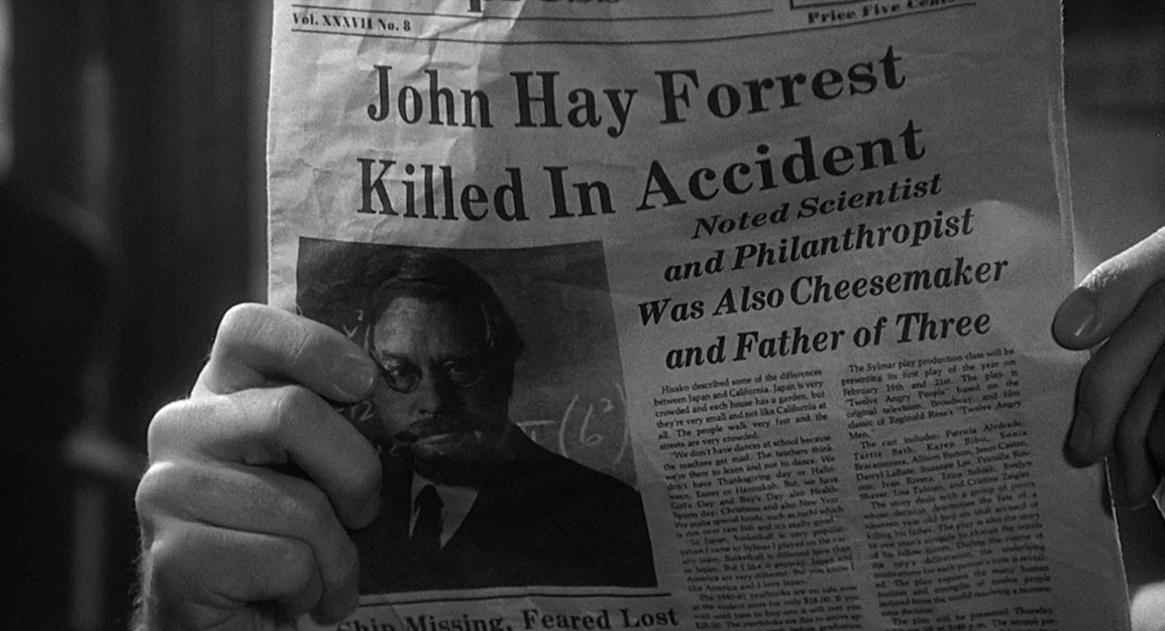 Dead Men Don’t Wear Plaid (1982) movie still: closeup — A close-up of a newspaper page with the headline John Hay Forrest Killed In Accident. Two…