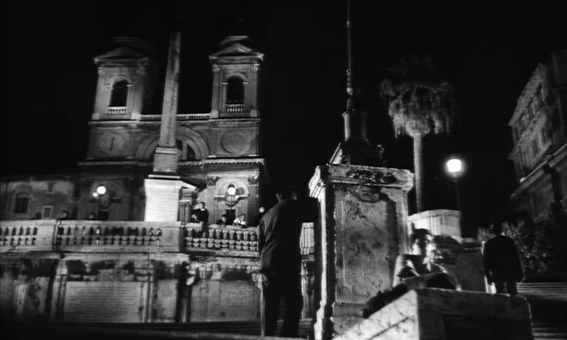 The Girl Who Knew Too Much (1963) movie still: wide — The Trinità dei Monti church stands atop the Spanish Steps in Rome at night. Several…