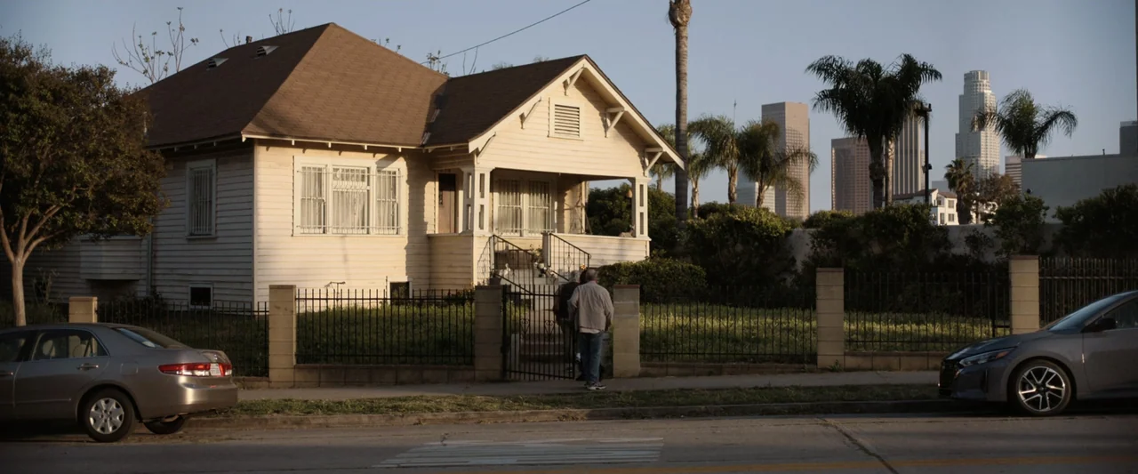 True Account: Breaking the Truce (Yakuza Bloody Chronicles 2) (2007) movie still: wide — A single-story wooden residential house stands behind a…