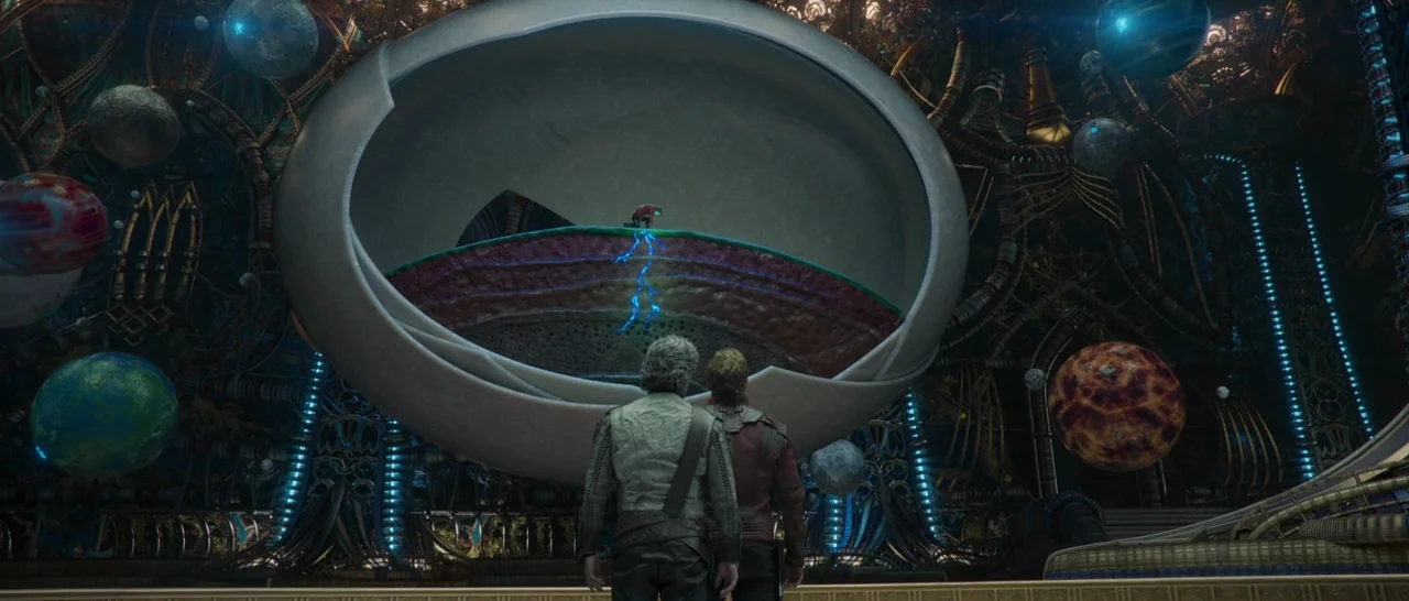 Guardians of the Galaxy Vol. 2 (2017) movie still: wide — An ornate circular chamber filled with floating planetary models and complex, glowing…