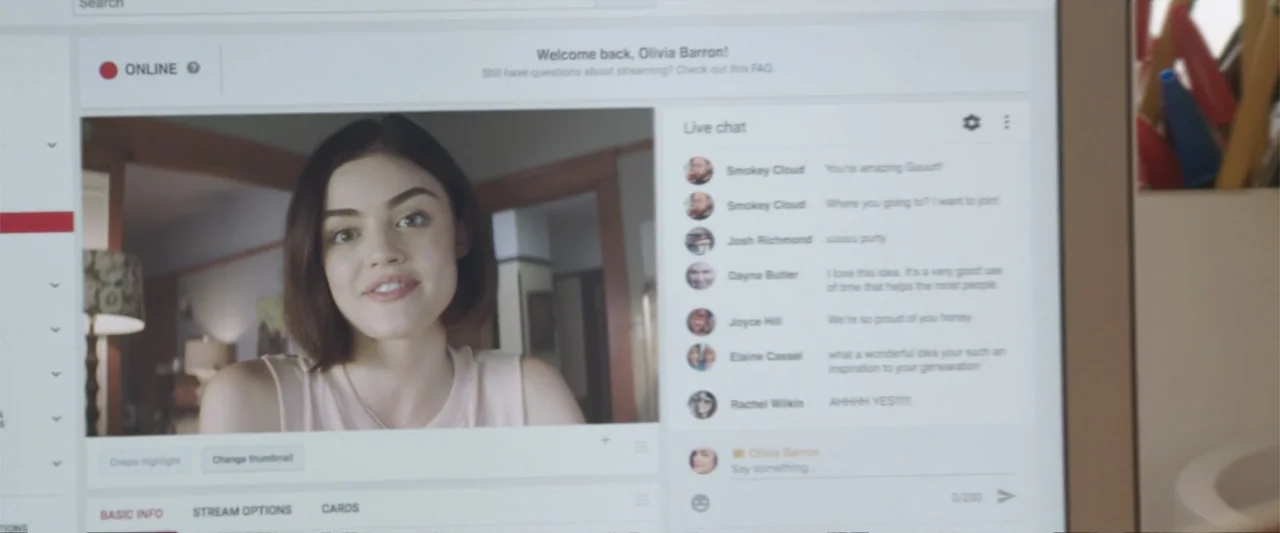 Truth or Dare (2018) movie still: medium — A close-up view of a computer screen showing a live video streaming interface. A young woman appears in…