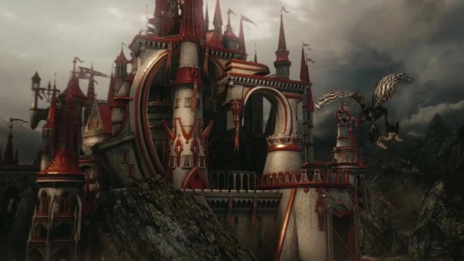 Alice in Wonderland (2010) movie still: establishing — An ornate white and red stone castle stands atop a rugged rock formation. A winged creature…