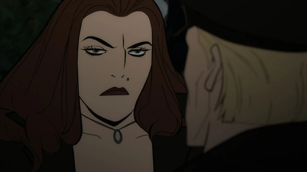 Batman: The Long Halloween, Part Two (2021) movie still: closeup — A dark outdoor space at night with two people facing each other. A woman with…