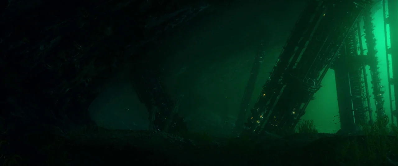 Valerian and the City of a Thousand Planets (2017) movie still: establishing — An underwater landscape features large, dark, metallic structures…