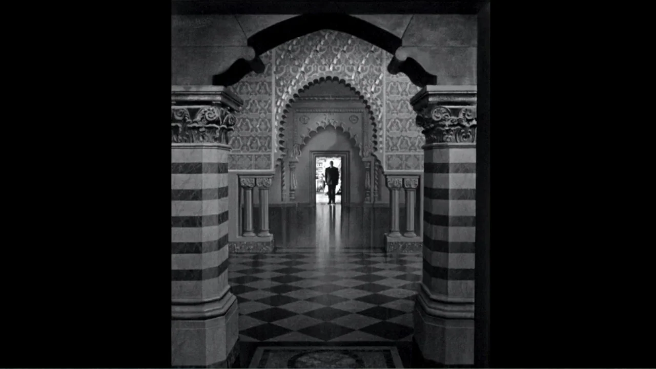 Chesley Bonestell: A Brush with the Future (2018) movie still: wide — An ornate interior corridor features Moorish archways and a checkerboard stone…