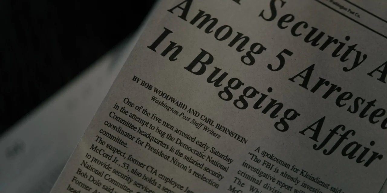 Mark Felt: The Man Who Brought Down the White House (2017) movie still: closeup — A close-up view of a Washington Post newspaper page featuring…