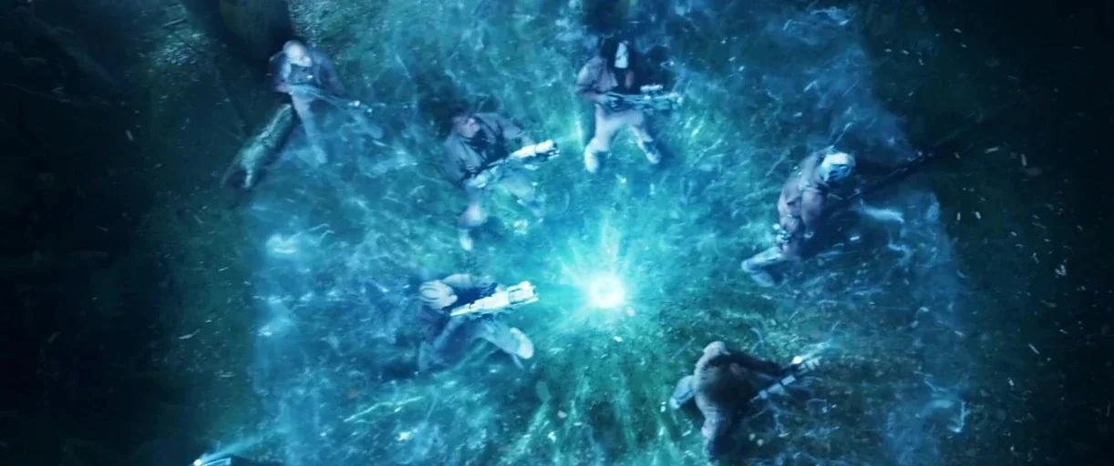 Guardians of the Galaxy Vol. 2 (2017) movie still: wide — A group of soldiers stands in a circle within a dark, wooded clearing at night. The men…